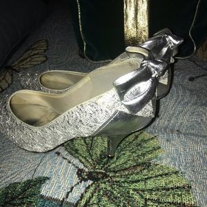 Silver dress shoes with decorative bow